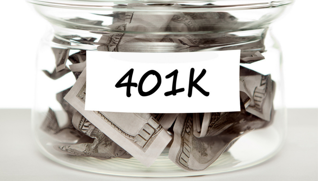 A glass jar labeled 401K filled with U.S. dollar bills represents retirement savings and financial planning in Wisconsin.