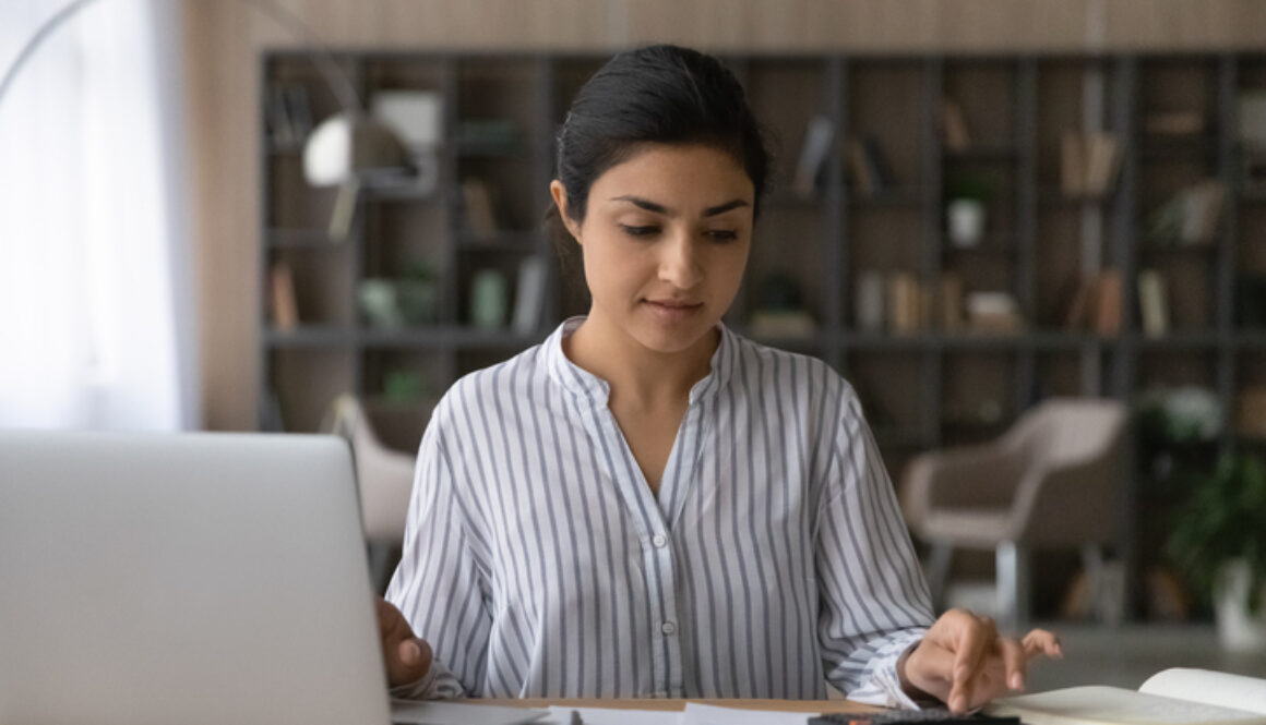 A woman at a computer planning for the future of her special needs child.